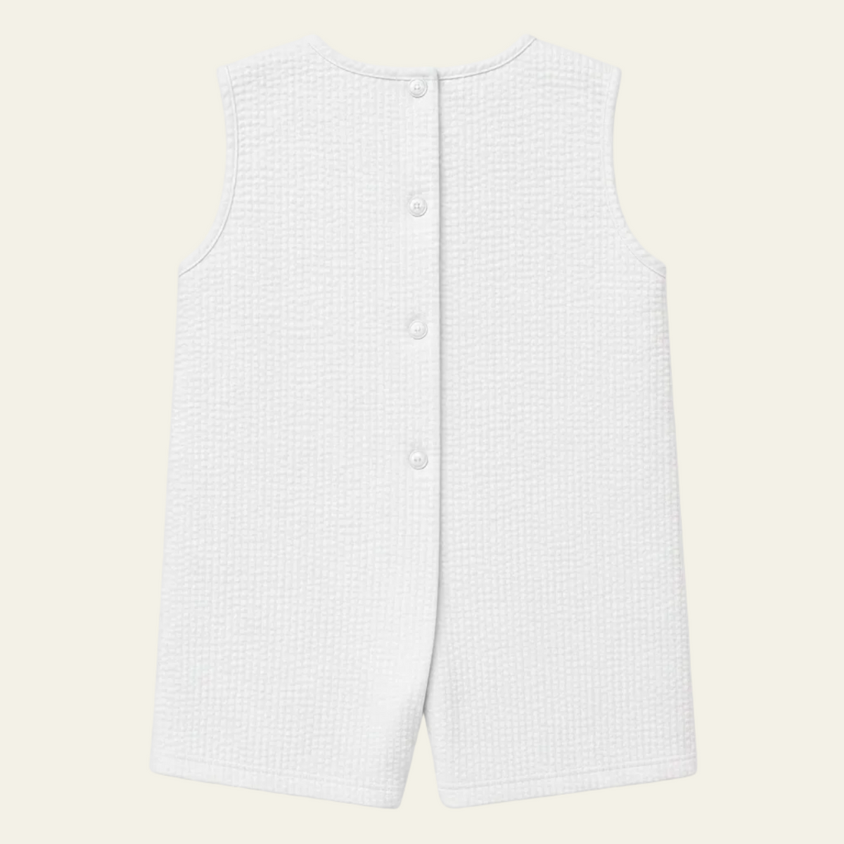Petit Ami white seersucker bubble, back, showing the buttoned closure
