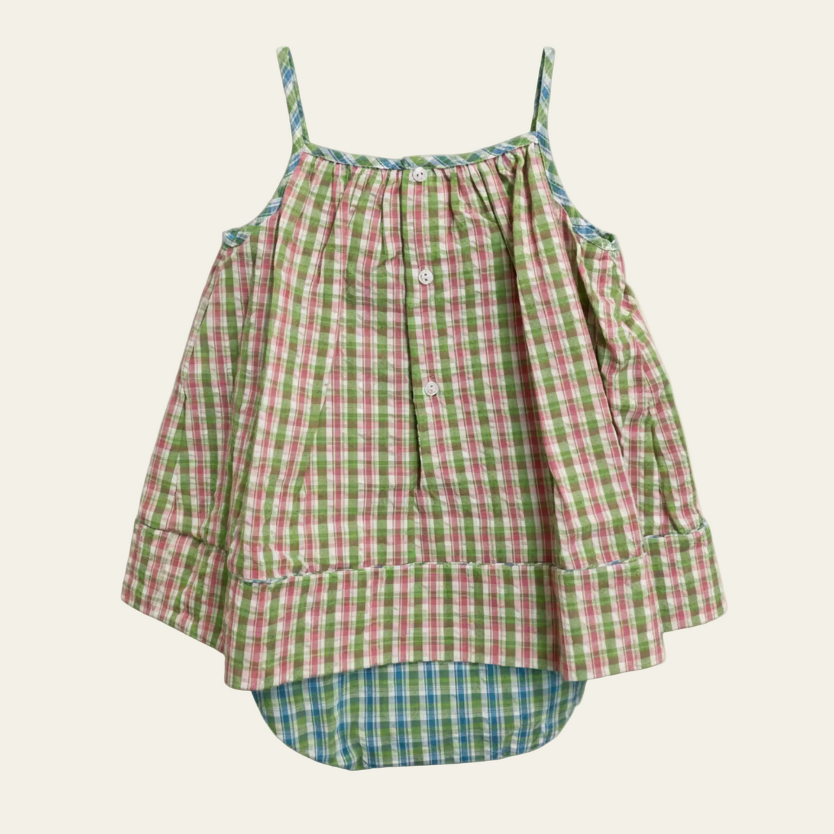 Petit Ami plaid sundress, back, showing the buttoned closure and contrasting plaid bloomers