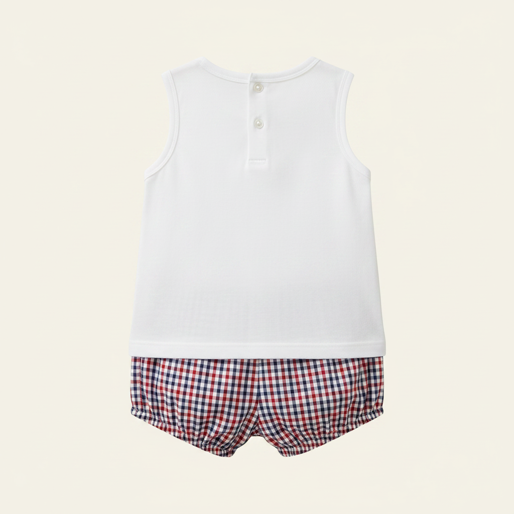 Petit Ami sailboat set, back, showing the buttoned closure on the white top