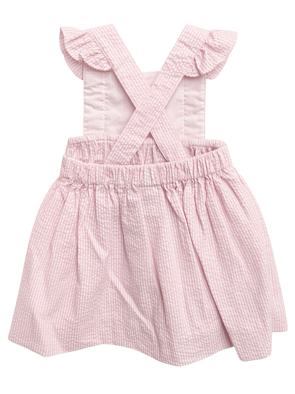 Petit Ami pink seersucker pinafore, back, showing the crossed straps and elasticated waist