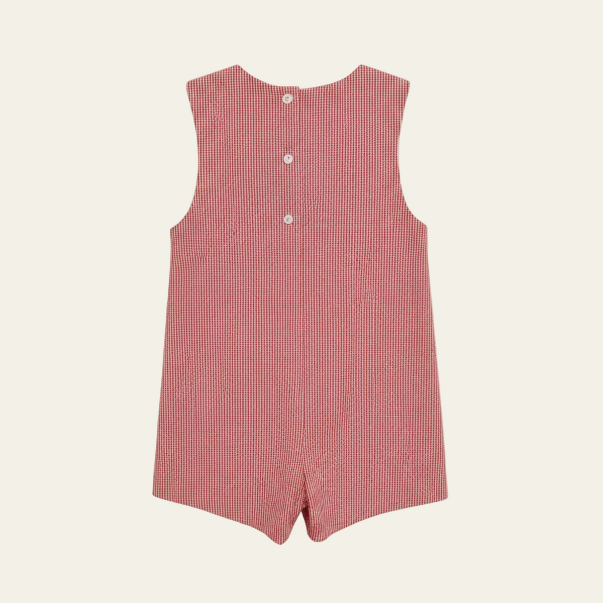 Petit Ami red gingham seersucker shortall, back, showing the buttoned closure