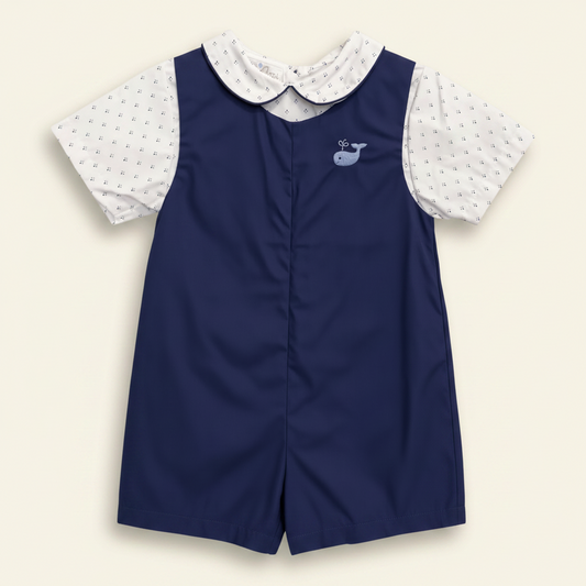 Petit Ami navy whale bobby suit, front, worn over a white foulard-print collar shirt