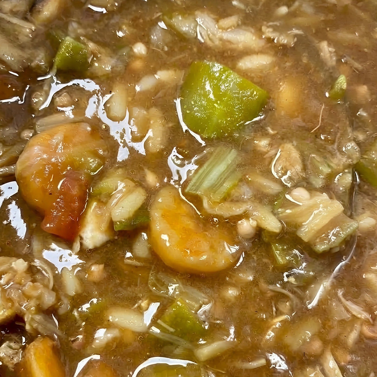 Southern Shells seafood gumbo warmed in the pot — Gulf shrimp, crab, okra and rice